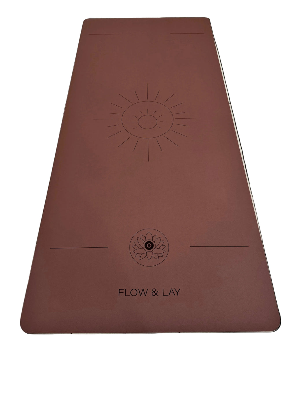A red rocks Sedona colored extra wide yoga mat with engraved sun design and the text 'FLOW & LAY' at the bottom